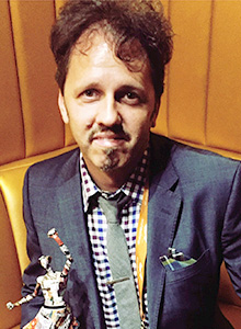 Sean Hickey, Senior Vice-President, Sales and Business Development, Naxos of America, received the award on behalf of the DSO and Leonard Slatkin.