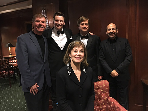 Conductor JoAnn Falletta (front) with (back L-R) composer Kenneth Fuchs, countertenor Aryeh Nussbaum Cohen, VSO Principal cellist Michael Daniels, and arranger David Krane.
