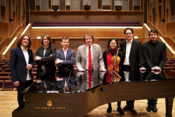 (From L to R) Pianists Roman Kosyakov, Daniel Lebhardt, Pascal Pascaleff, Royal Birmingham Conservatoire Principal Julian Lloyd Webber, violist Yue Yu, and pianists Domonkos Csabay and Andrey Ivanov
