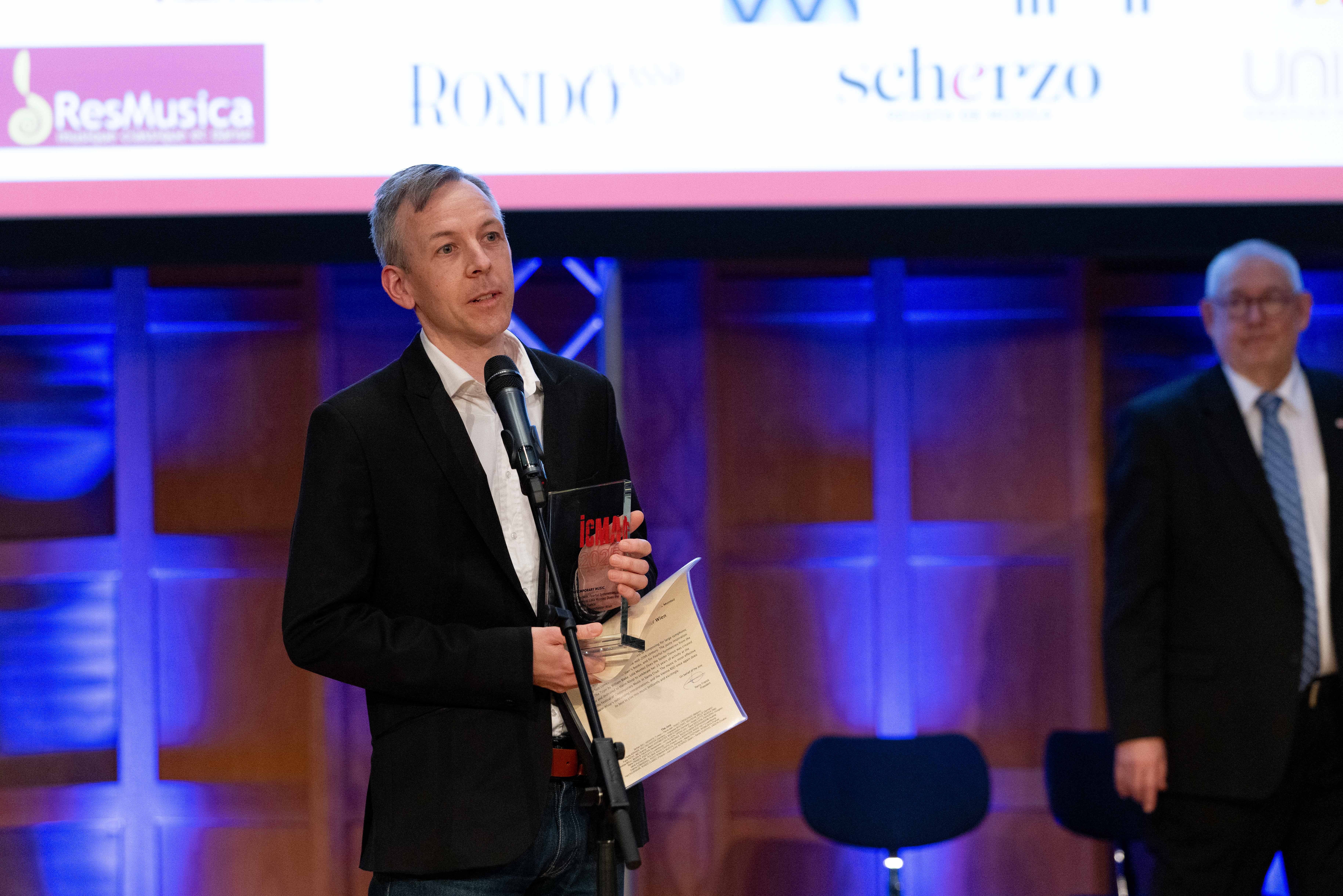 Iwen Schmees, CEO of Naxos Deutschland and Global COO of Naxos Music Group, accepts the Contemporary Music Award on behalf of Marin Alsop Iwen Schmees, CEO of Naxos Deutschland and Global COO of Naxos Music Group, accepts the Contemporary Music Award on behalf of Marin Alsop